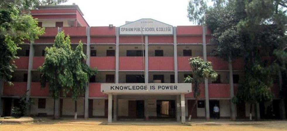 Alumni from different generations connecting on a school campus